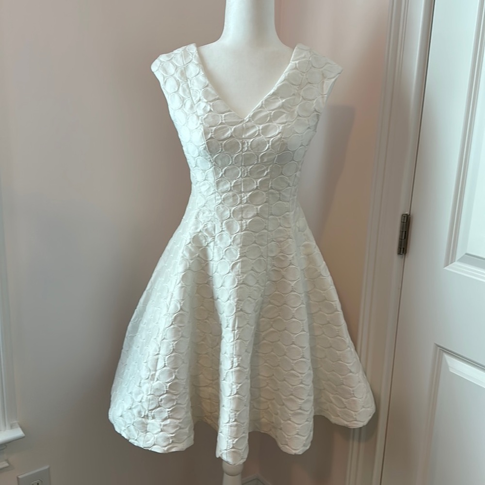 Perfect for a fun summer white party! Worn once.